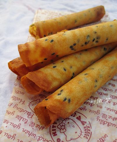 香脆口感並帶著芝麻香的芝麻蛋捲,會一口接著一口的吃 ^_^