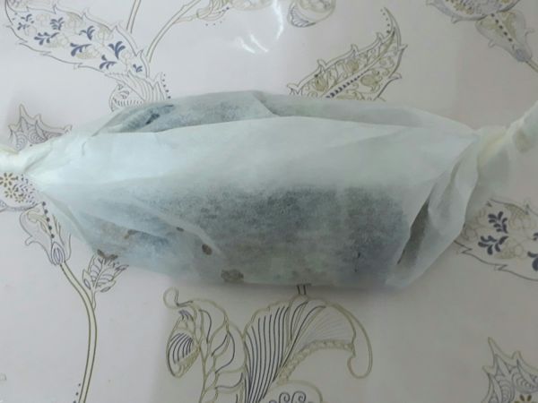 把它包起來。
（盡量不要有缺口，以免加熱時蒸氣跑掉）