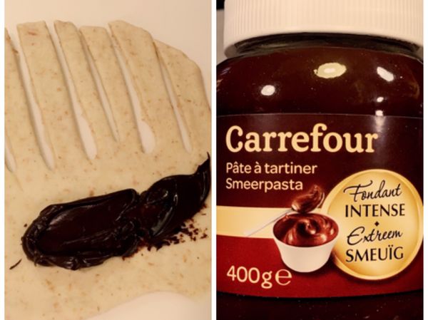 麵團壓扁擀平後，包入巧克力醬捲起