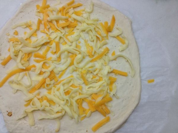 灑上拉絲起司