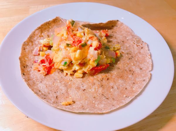 把材料放上（烤過、煎過的）餅皮