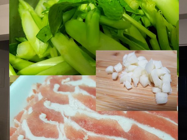 準備好食材，芥藍菜切段，蒜頭隨意切小
