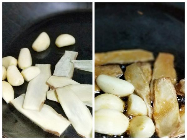 先少許沙拉油熱鍋，把薑、蒜用中大火炸到表皮金黃，再倒下麻油續炒。