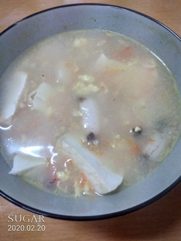 “蟹黃豆腐煲”即完成。