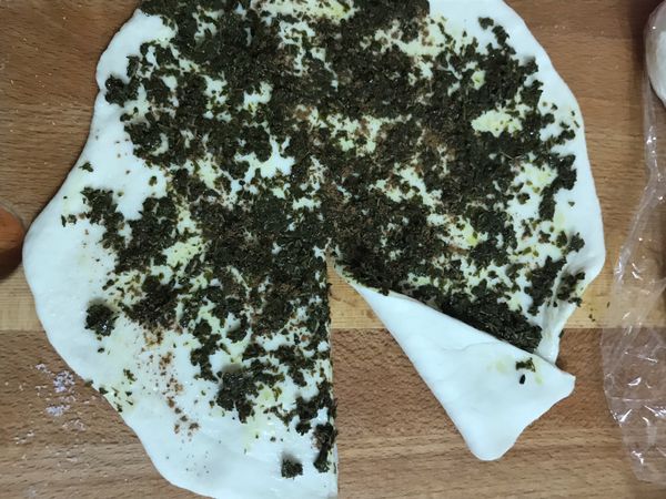 捲起來，再桿開。