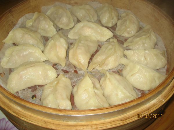 水煮滾後，再放上蒸籠，用大火蒸10分鐘。