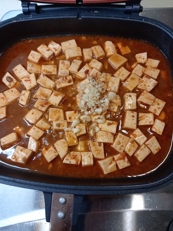 加入薑末，蒜末然後收汁