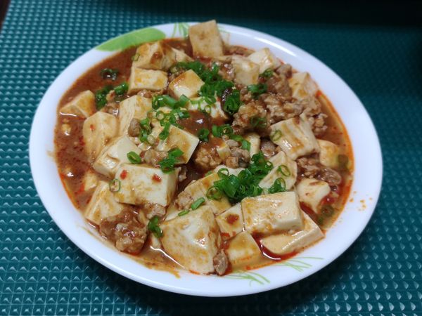 拌勻收汁即可盛盤，撒上適量蔥花