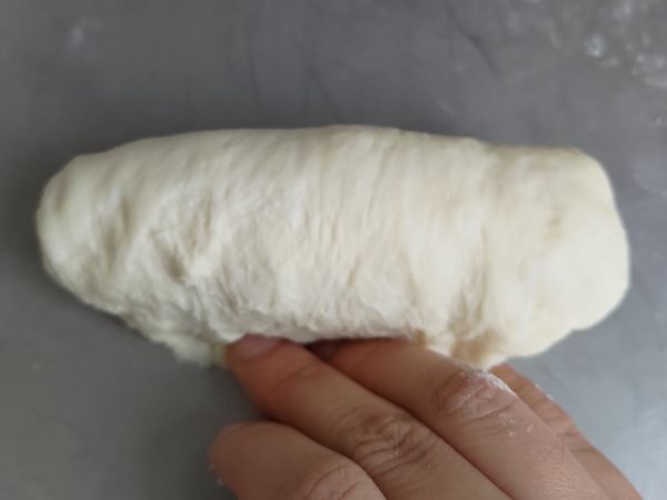 再由上往下卷 收邊壓緊