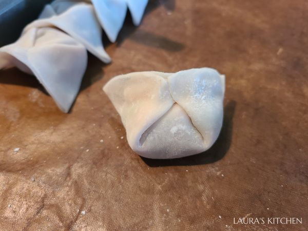 用虎口把收口捏緊