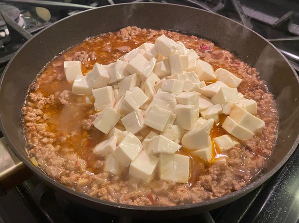 加入豆腐 小心的拌一拌