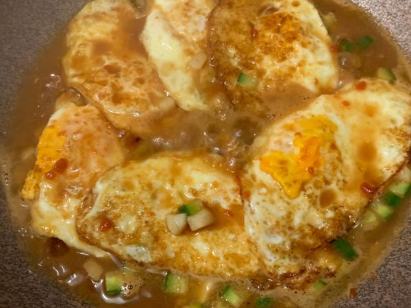 把蛋包放入大火收汁即可