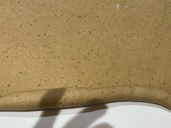 從一邊長邊開始捲