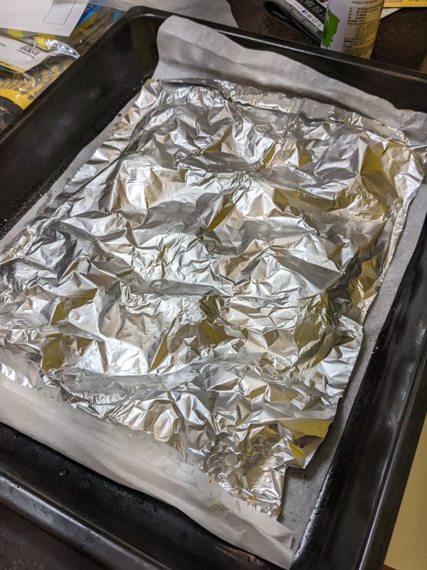 然後蓋上去包緊, 就可以送入烤箱