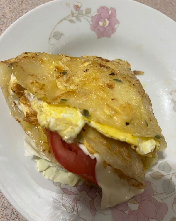 從起司對折，再往右折，再對折