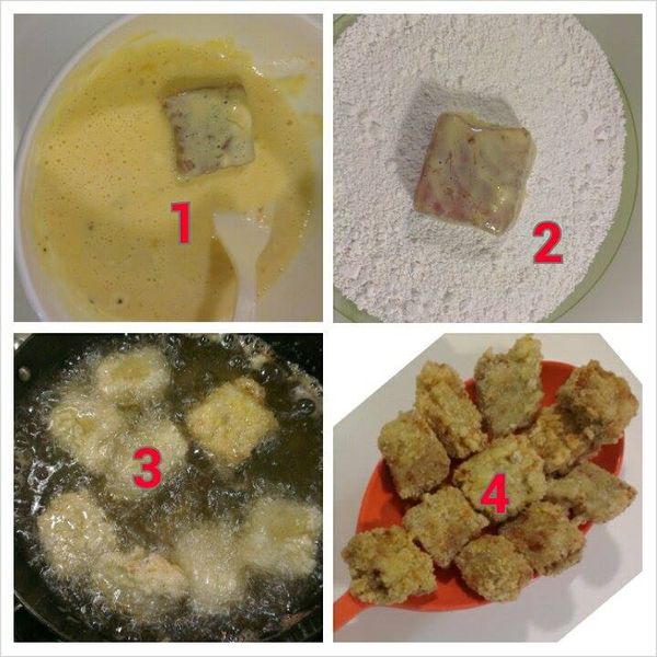 將魚塊先裹著[麵衣]，再沾些地瓜粉，放入油鍋油炸至兩面金黃即可撈出!放入盤中即可