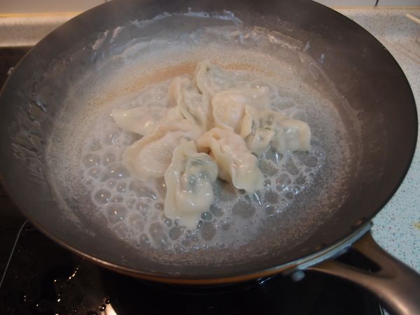 轉小火煮至水份收乾。