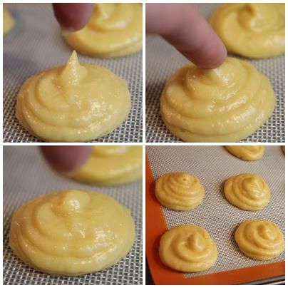 烤盤上放烘焙紙, 擠上適量的麵糊 (大小請自行決定), 需有間隔距離待泡芙膨脹

    ** 麵糊上若有小尖頂, 一定要用手沾點水壓平. 這樣在烤的過程中, 才不會受熱不均而烤焦