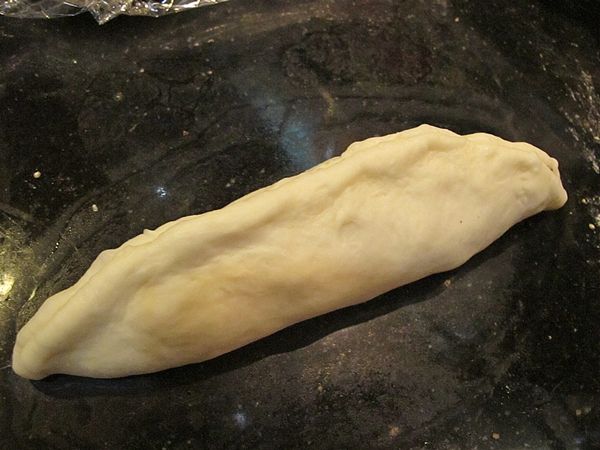 像封餃子內餡那樣...