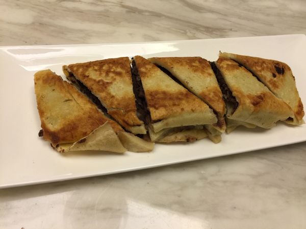 切小塊盛盤，灑上花生粉即可