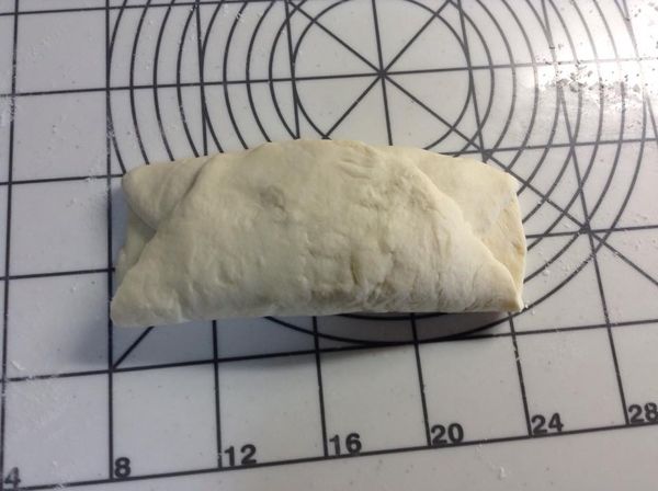 再由下向上折。