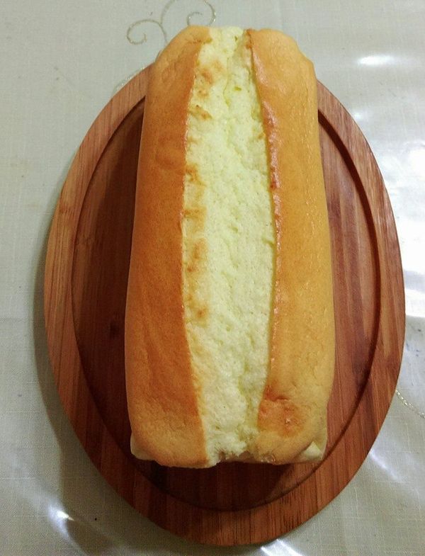 烤完立即取出,放網架將烘培紙撕開放涼