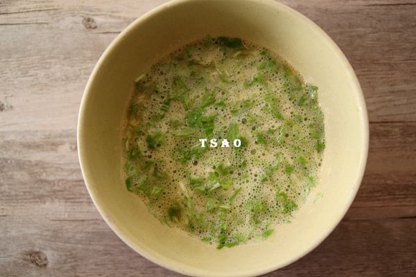 再將水菜拌入。