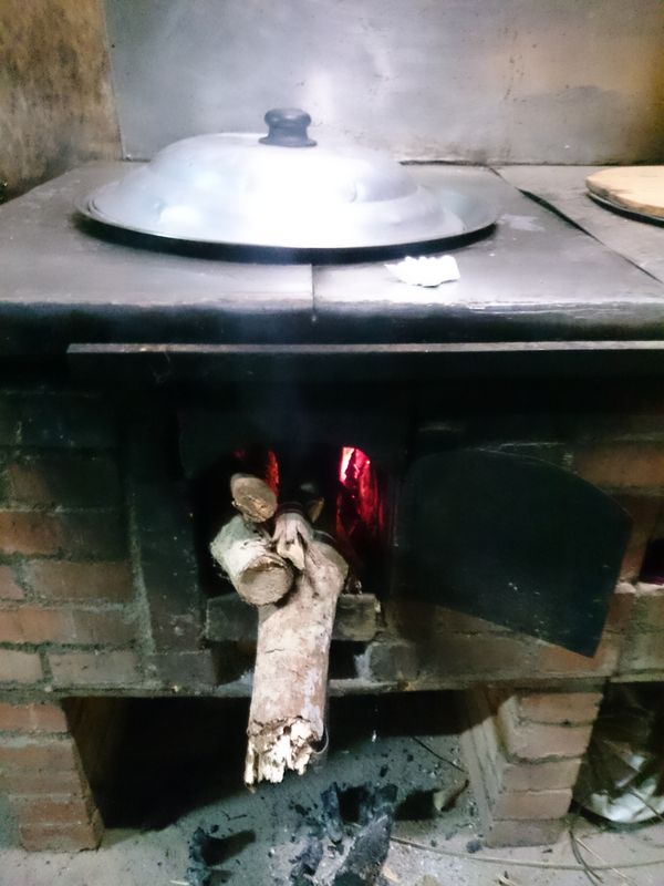 磨完米就可以點火熱鍋了