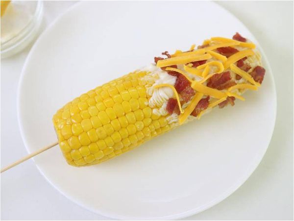 再裹上巧達起司絲。