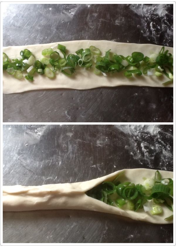 8.放上蔥花，將兩面麵皮捏合，將蔥花包覆在內。