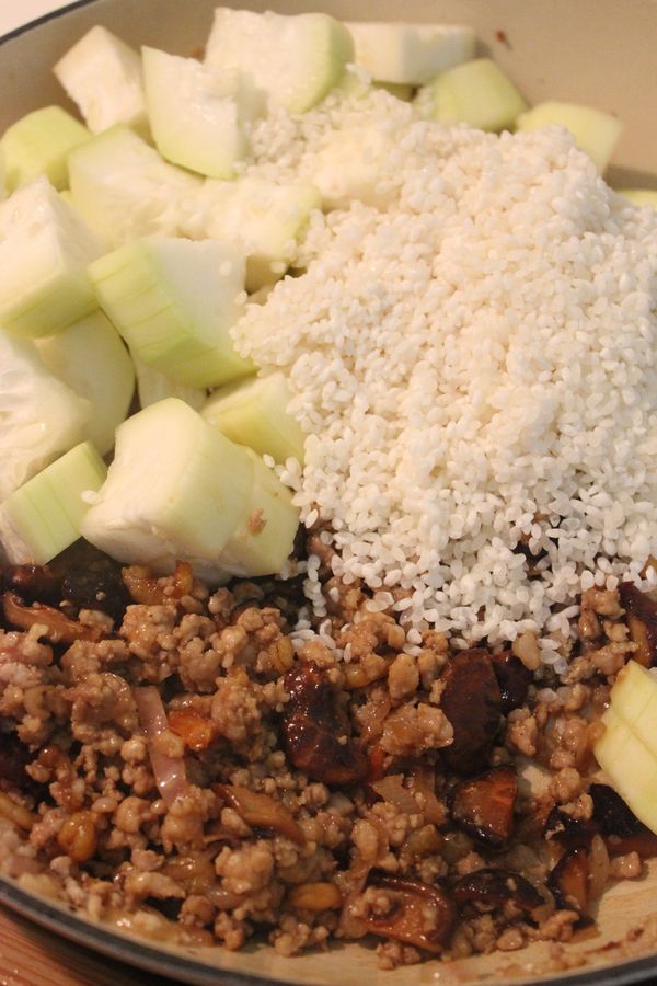 放入白米與蒲瓜拌勻