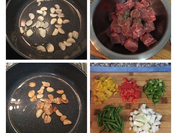 平底鍋放橄欖油，冷油中火下蒜片，煎到開始有淡黃色時轉小火，將蒜頭翻面再略煎到顏色略深，起鍋，攤開放在吸油面紙上。
煎蒜片的同時把牛肉切方塊用1/2茶匙的鹽和黑胡椒粉抓勻備用。
青豆切等長，洋蔥和甜椒切比牛肉略小ㄧ點的方丁。