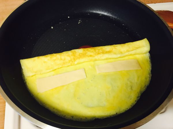 再卷一捲，再放起司片