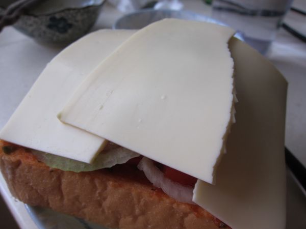 鋪上 起司條 或 起司片